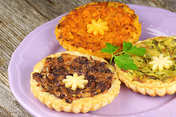 Image showing Three mini vegetarian quiches