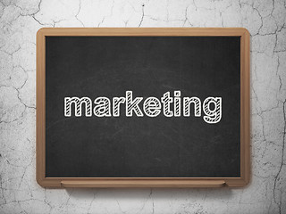 Image showing Advertising concept: Marketing on chalkboard background
