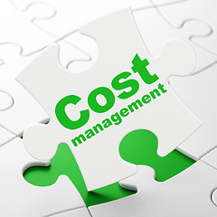 Image showing Finance concept: Cost Management on puzzle background