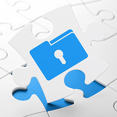 Image showing Finance concept: Folder With Keyhole on puzzle background