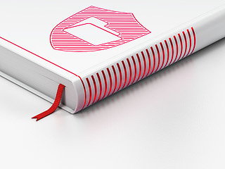 Image showing Business concept: closed book, Folder With Shield on white background