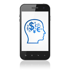 Image showing Business concept: Head With Finance Symbol on smartphone