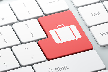 Image showing Vacation concept: Bag on computer keyboard background