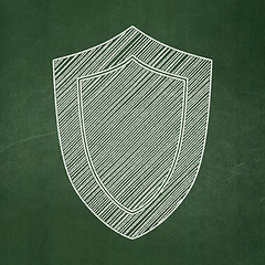 Image showing Protection concept: Shield on chalkboard background