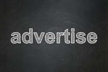 Image showing Advertising concept: Advertise on chalkboard background