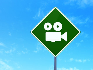 Image showing Vacation concept: Camera on road sign background