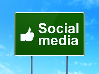 Image showing Social media concept: Social Media and Thumb Up on road sign background