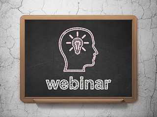 Image showing Education concept: Head With Lightbulb and Webinar on chalkboard background