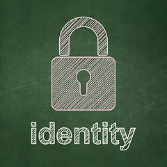 Image showing Protection concept: Closed Padlock and Identity on chalkboard background