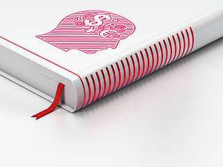 Image showing Advertising concept: closed book, Head With Finance Symbol on white background