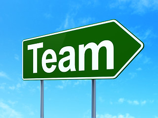 Image showing Business concept: Team on road sign background