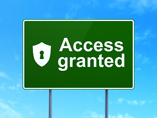 Image showing Privacy concept: Access Granted and Shield Keyhole on road sign