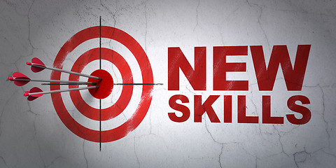 Image showing Education concept: target and New Skills on wall background