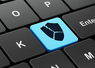 Image showing Privacy concept: Broken Shield on computer keyboard background