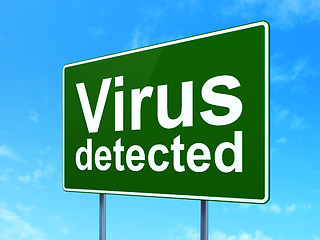 Image showing Security concept: Virus Detected on road sign background