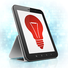 Image showing Finance concept: Light Bulb on tablet pc computer