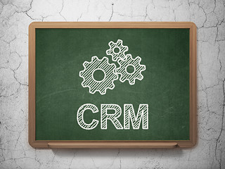 Image showing Business concept: Gears and CRM on chalkboard background