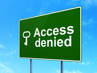 Image showing Privacy concept: Access Denied and Key on road sign background