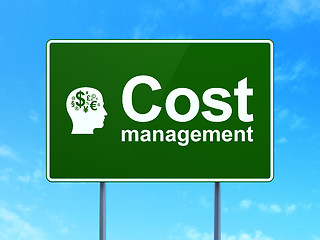 Image showing Finance concept: Cost Management and Head With Finance Symbol on road sign background
