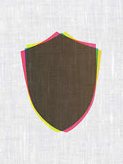 Image showing Security concept: Shield on fabric texture background