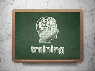 Image showing Education concept: Head With Finance Symbol and Training on chalkboard