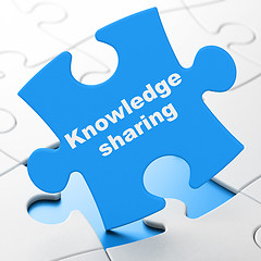 Image showing Education concept: Knowledge Sharing on puzzle background
