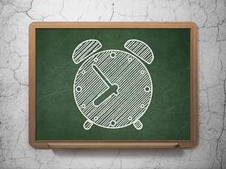 Image showing Time concept: Alarm Clock on chalkboard background