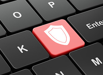 Image showing Safety concept: Shield on computer keyboard background