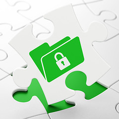 Image showing Business concept: Folder With Lock on puzzle background