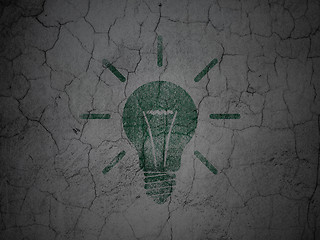 Image showing Finance concept: Light Bulb on grunge wall background