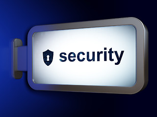 Image showing Protection concept: Security and Shield With Keyhole on billboard background