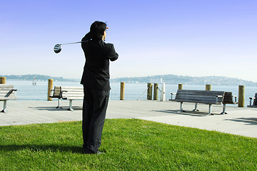 Image showing Golfing businessman