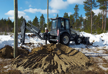 Image showing Excavator digs pillar pylon 