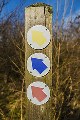 Image showing three coloured arrows