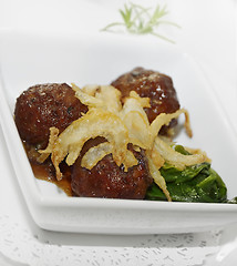 Image showing Meatballs With Onion And Spinach
