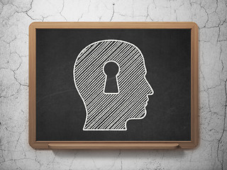 Image showing Education concept: Head With Keyhole on chalkboard background