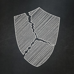 Image showing Privacy concept: Broken Shield on chalkboard background