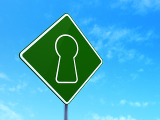 Image showing Data concept: Keyhole on road sign background