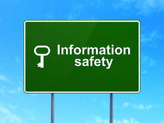 Image showing Protection concept: Information Safety and Key on road sign background