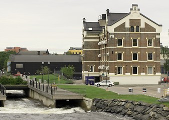 Image showing Building near the river.