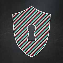 Image showing Privacy concept: Shield With Keyhole on chalkboard background