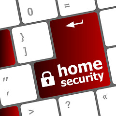 Image showing Safety concept: computer keyboard with Home security icon on enter button background