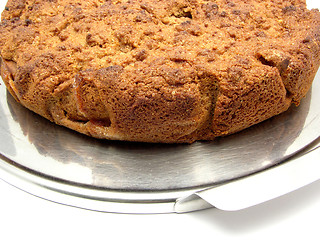 Image showing Wholemeal cake with pears arranged on a tray