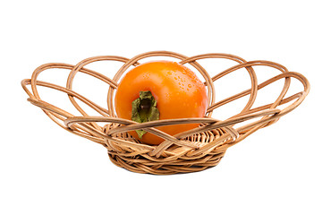 Image showing Persimmon fruit in wicker