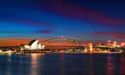 Image showing Sydney Opera House and Harbour Bridge at sundown