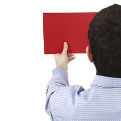 Image showing Man holding a paper