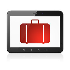 Image showing Tourism concept: Bag on tablet pc computer