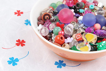 Image showing Bowl of beads and buttons