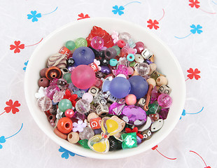 Image showing Bowl of beads and buttons