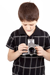 Image showing young boy with old vintage analog SLR camera